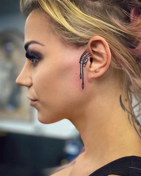 cute small face tattoos for females